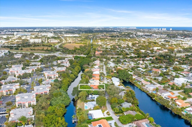 drone / aerial view with a water view