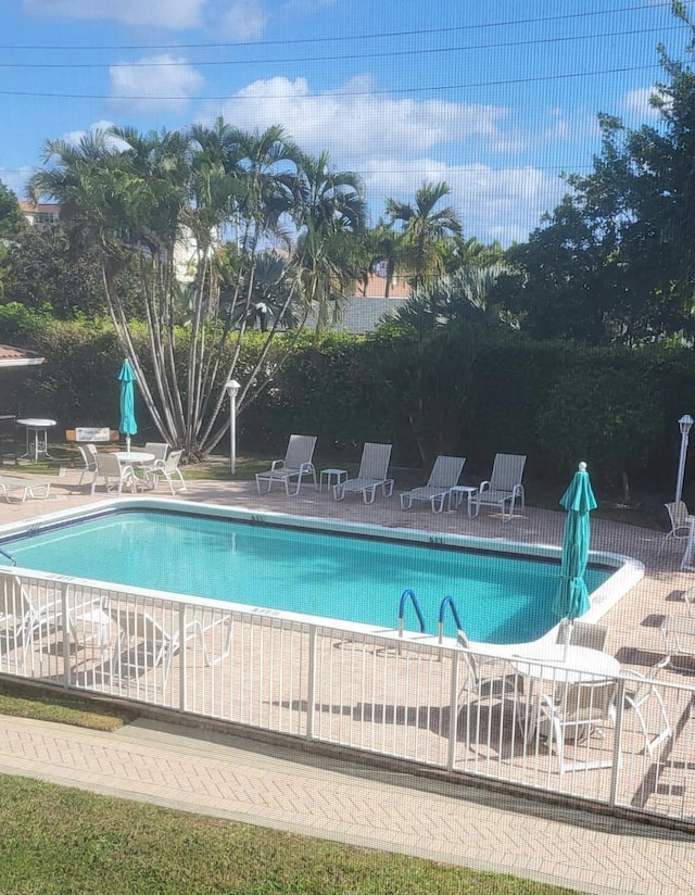 view of pool with a patio