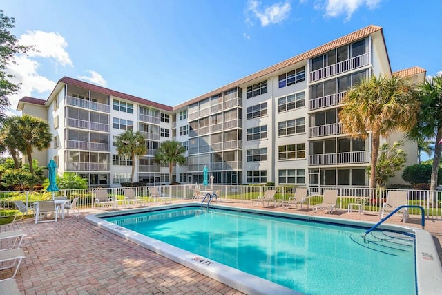 view of swimming pool featuring a patio