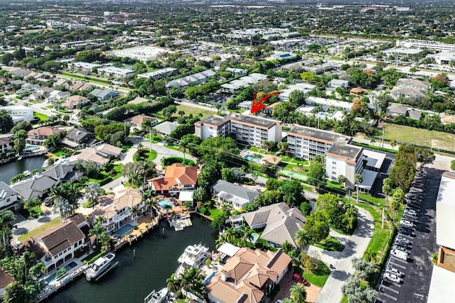 drone / aerial view with a water view