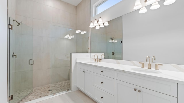 205 SE Via Sangro, Port Saint Lucie, FL 34952 - full bathroom with a shower stall, double vanity, and tile patterned floors