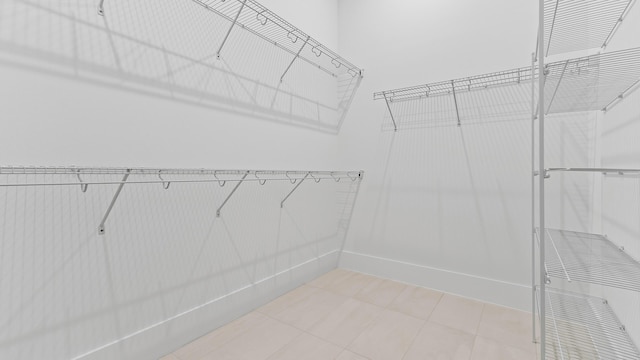205 SE Via Sangro, Port Saint Lucie, FL 34952 - spacious closet featuring tile patterned floors