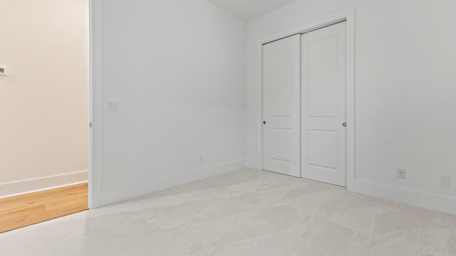 205 SE Via Sangro, Port Saint Lucie, FL 34952 - unfurnished bedroom featuring baseboards and a closet