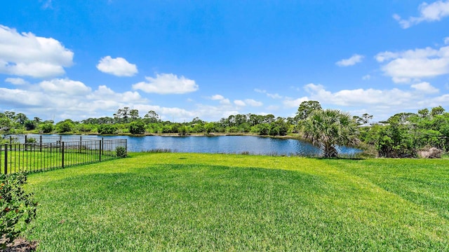 205 SE Via Sangro, Port Saint Lucie, FL 34952 - water view featuring fence