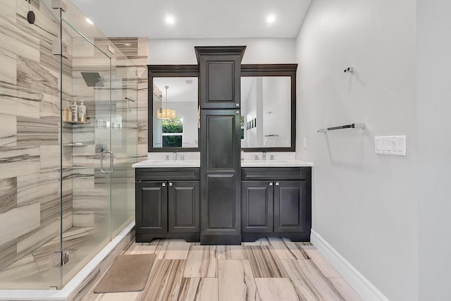 bathroom with vanity and an enclosed shower