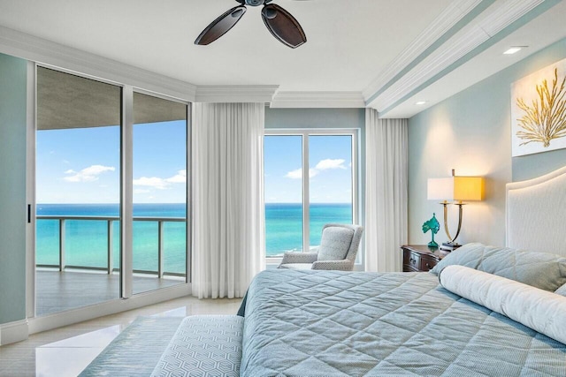 bedroom with a water view, ceiling fan, access to outside, and multiple windows