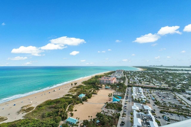 bird's eye view with a view of the beach and a water view