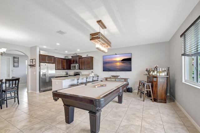 recreation room with light tile patterned floors and pool table