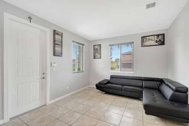 living room featuring light tile patterned flooring