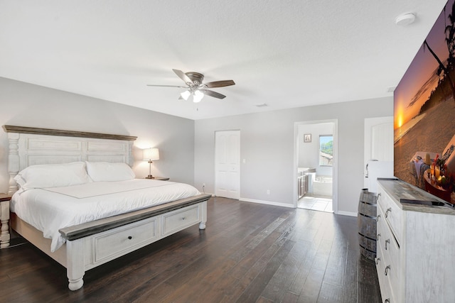 bedroom with dark wood-type flooring, ceiling fan, a closet, and ensuite bath