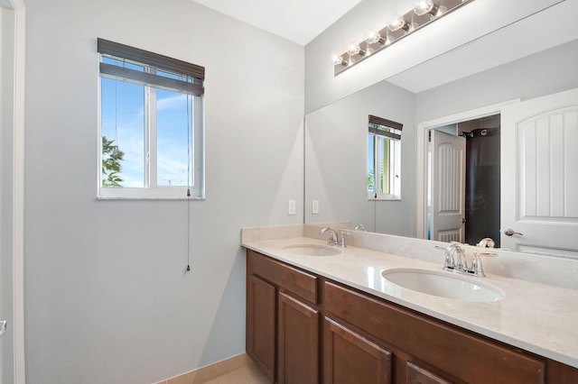 bathroom with vanity and tile patterned floors