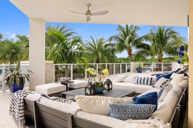 view of patio with a balcony, an outdoor hangout area, and ceiling fan