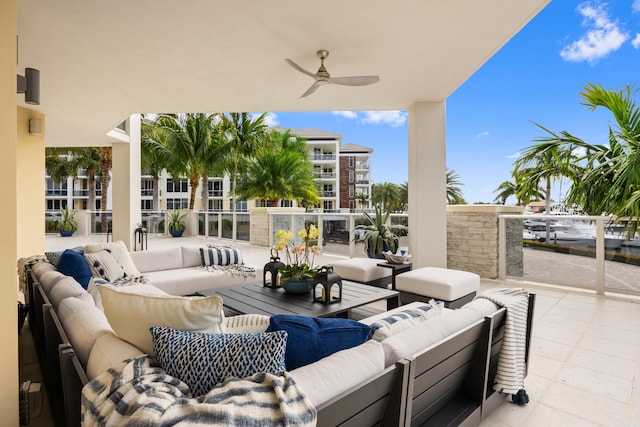 view of patio with ceiling fan and an outdoor living space