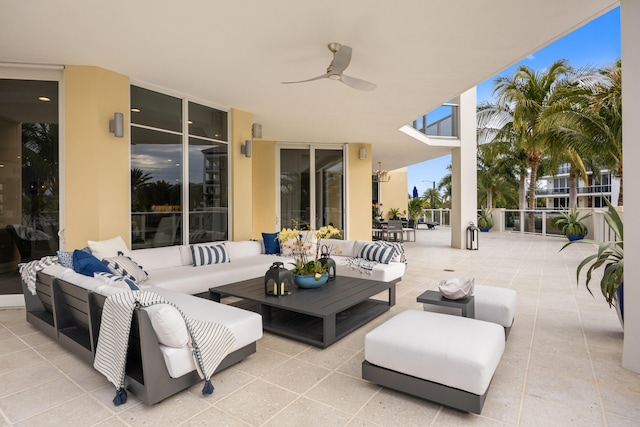 view of patio / terrace with ceiling fan and an outdoor hangout area