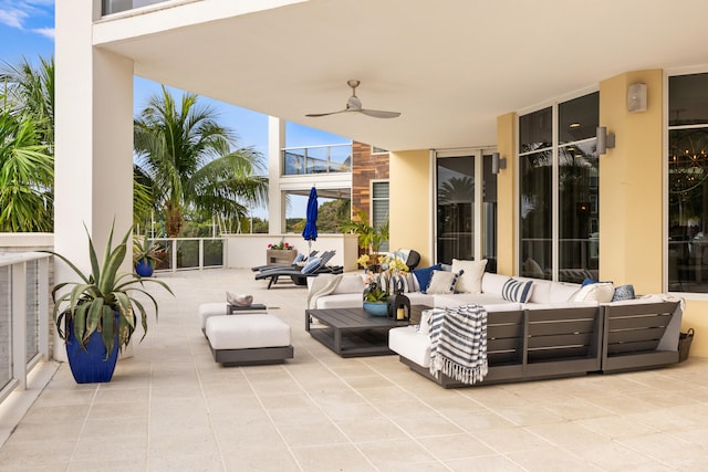 view of patio featuring ceiling fan and outdoor lounge area