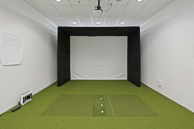 game room featuring a paneled ceiling and carpet flooring