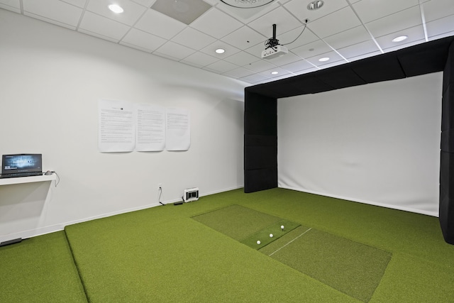 playroom featuring carpet floors and a paneled ceiling