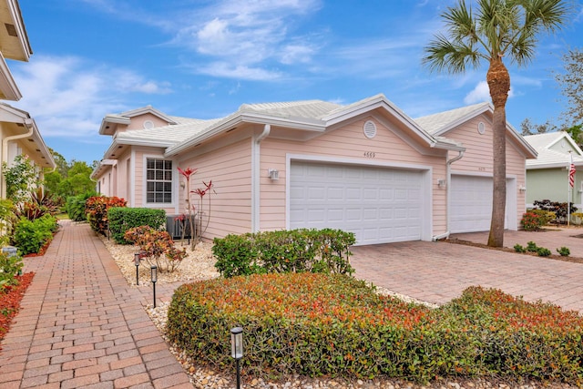 single story home featuring a garage