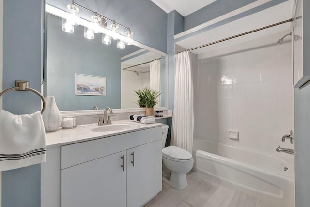 full bathroom with vanity, toilet, and shower / bath combo with shower curtain