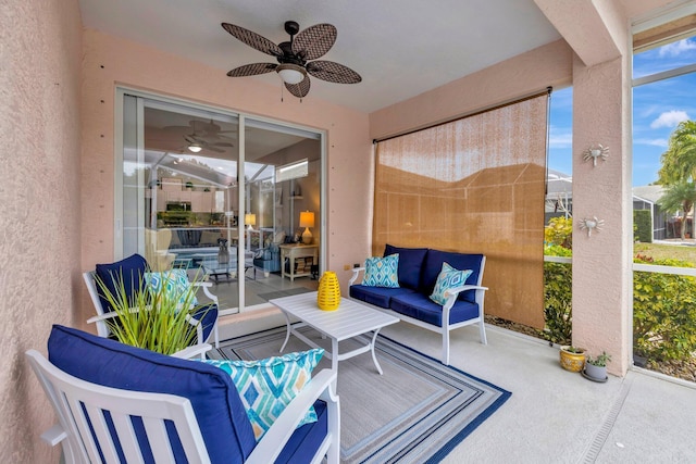 view of patio with outdoor lounge area and ceiling fan