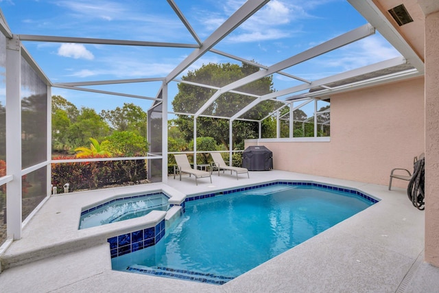 view of swimming pool featuring an in ground hot tub, a lanai, area for grilling, and a patio