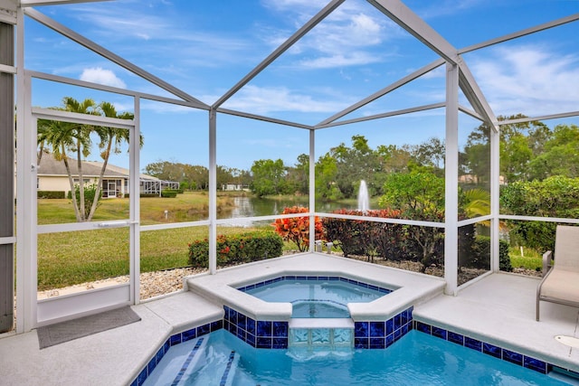 view of swimming pool featuring an in ground hot tub, a water view, and a lanai