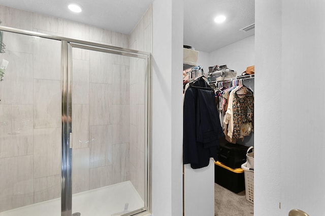 bathroom with an enclosed shower