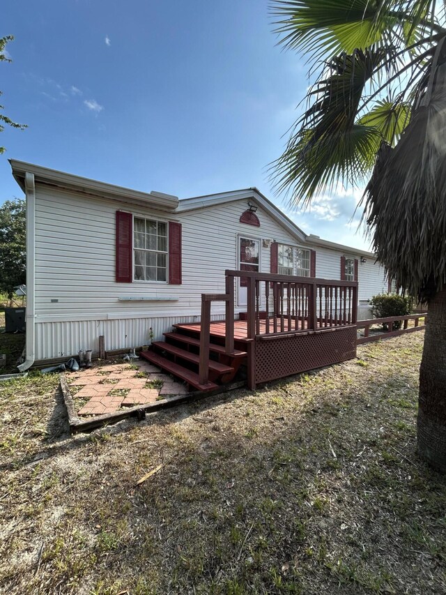 view of yard featuring a deck