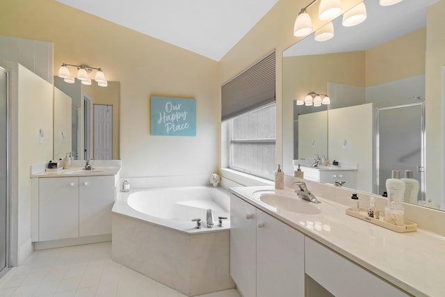 bathroom with lofted ceiling, tile patterned floors, separate shower and tub, and vanity