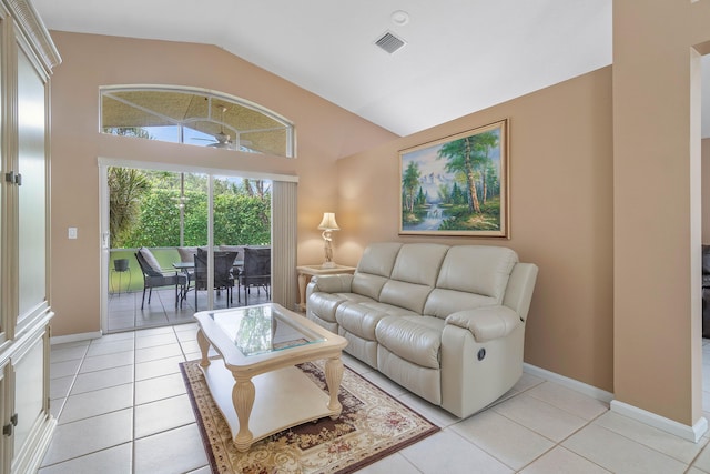 tiled living room with vaulted ceiling