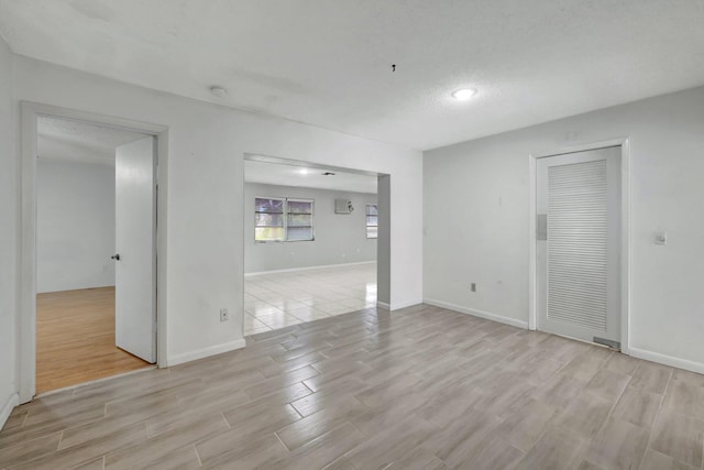 interior space featuring a textured ceiling