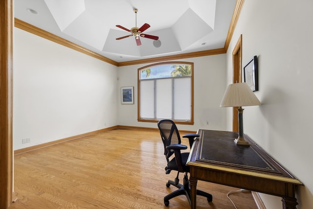 office with a raised ceiling, crown molding, ceiling fan, and light hardwood / wood-style floors