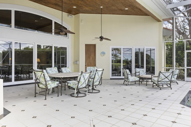 view of patio featuring ceiling fan