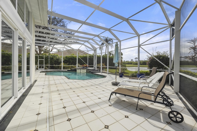 view of swimming pool featuring a patio area and glass enclosure