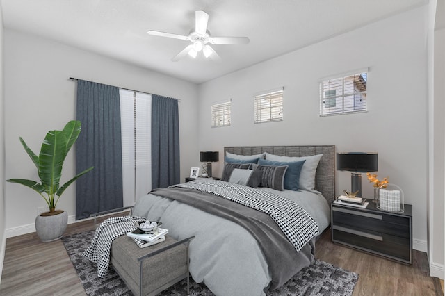 bedroom featuring ceiling fan and wood-type flooring