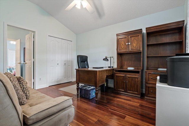 home office with washer / dryer, ceiling fan, lofted ceiling, and dark hardwood / wood-style floors