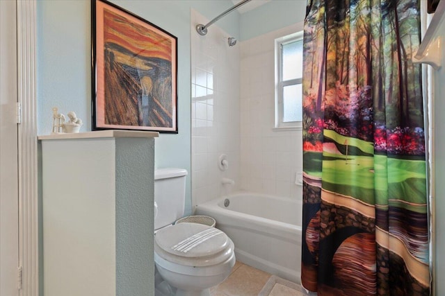 bathroom with toilet, shower / tub combo, and tile patterned floors