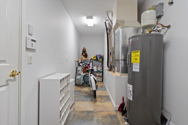 utility room with water heater