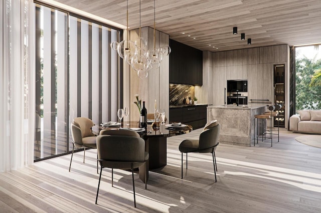 dining area featuring an inviting chandelier, wood ceiling, and light hardwood / wood-style flooring