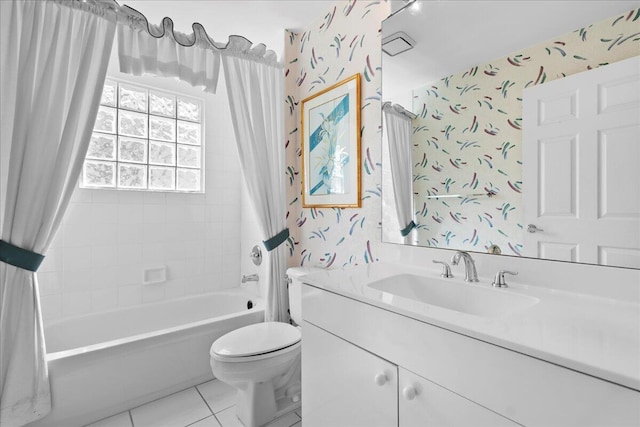 full bathroom with toilet, vanity, tile patterned flooring, and shower / bath combo