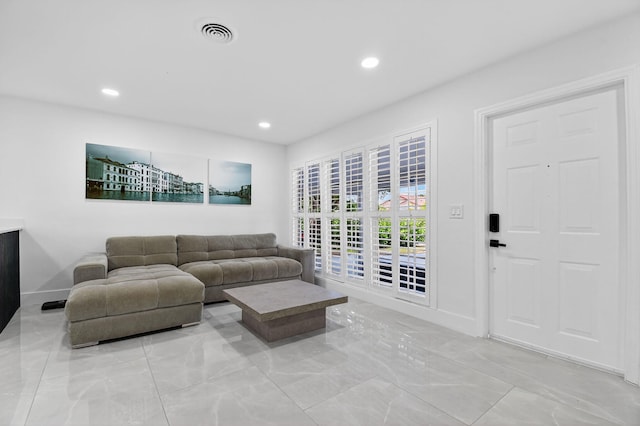 2112 N 14th Ter, Hollywood, FL 33020 - living room featuring light marble finish flooring and recessed lighting