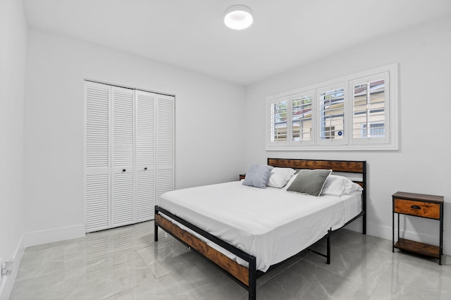 2112 N 14th Ter, Hollywood, FL 33020 - bedroom with a closet and baseboards