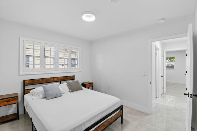 2112 N 14th Ter, Hollywood, FL 33020 - bedroom featuring baseboards