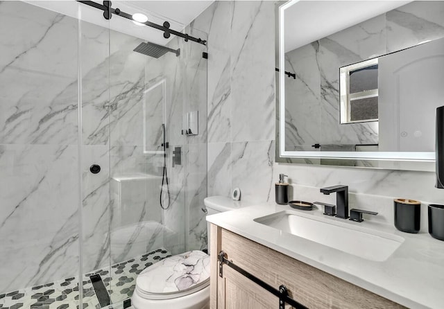 bathroom featuring tile walls, toilet, vanity, and an enclosed shower