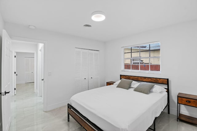 2112 N 14th Ter, Hollywood, FL 33020 - bedroom with a closet and baseboards