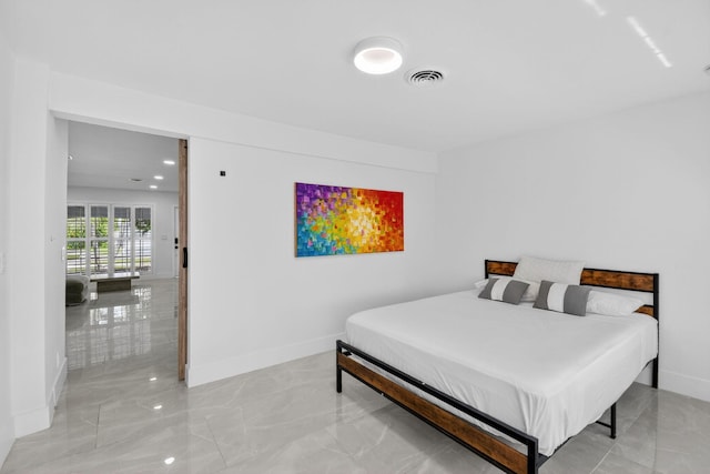 2112 N 14th Ter, Hollywood, FL 33020 - bedroom with light marble finish flooring and recessed lighting