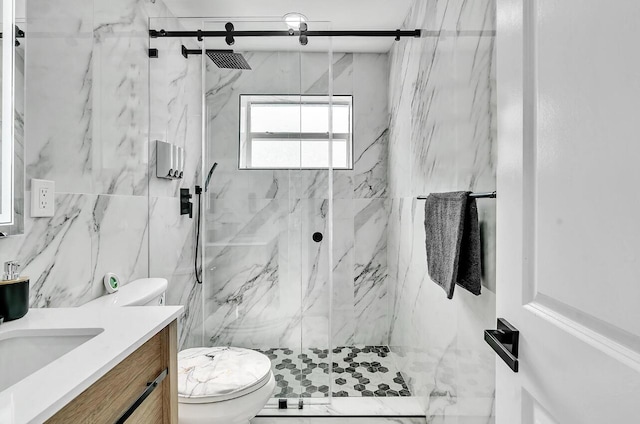 bathroom with walk in shower, vanity, tile walls, and toilet