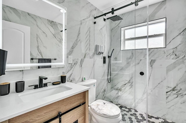 bathroom with a shower with door, tile walls, toilet, and vanity