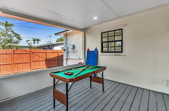 recreation room with billiards, a textured ceiling, and hardwood / wood-style flooring