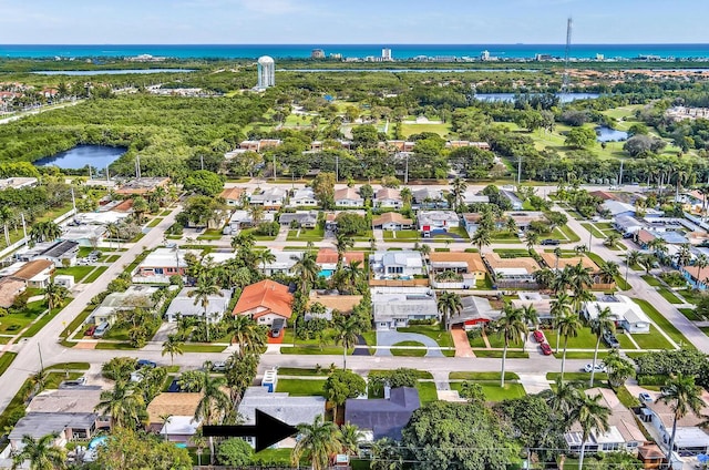 drone / aerial view featuring a water view